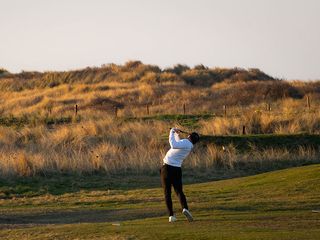 a junior golfer playing at Seaton Carew in the north-east of England