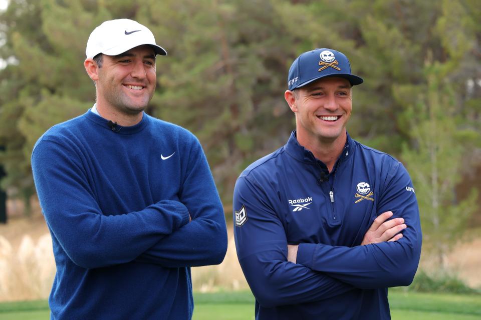 Bryson DeChambeau of LIV Golf and Scottie Scheffler of the PGA Tour look on before The Showdown: McIlroy and Scheffler vs. DeChambeau and Koepka at Shadow Creek Golf Course on December 16, 2024 in Las Vegas, Nevada. (Kevin C. Cox/Getty Images for The Showdown)
