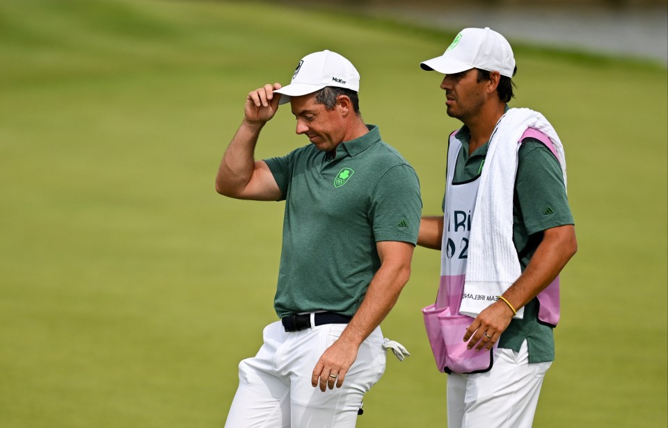 Rory McIlroy reacts to his double-bogey on the 15th hole