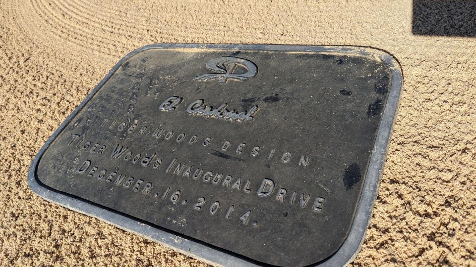 A plaque in a bunker on the first hole commemorates the opening tee shot Tiger Woods hit at his design at El Cardonal Golf Course at Diamante Cabo San Lucas. (Photo: Golfweek)