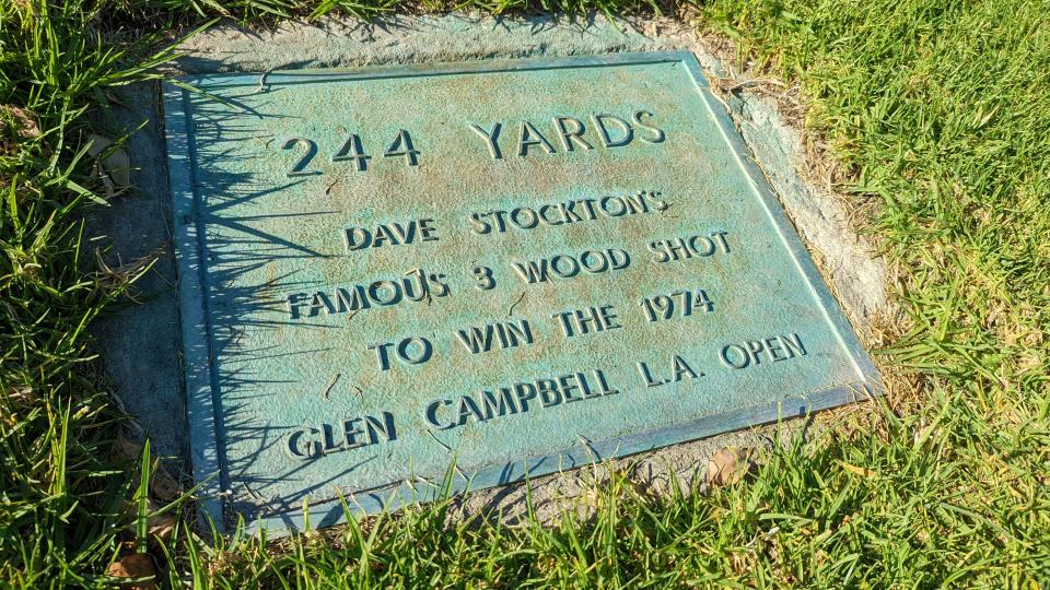 A plaque just left of the 18th fairway of Riviera County Club commemorates a shot hit by Dave Stockton in 1974 to set up a win in the L.A. Open. (Todd Kelly/Golfweek)