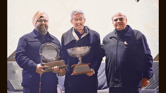 (L-R) Chandigarh Golf Club president Ravibir Singh Grewal, cup winner Girish Virk and club captain Rohit Dagar. (Keshav Singh/HT)