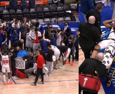 Pistons & Magic surround Jaden Ivey after scary injury then gets stretchered off