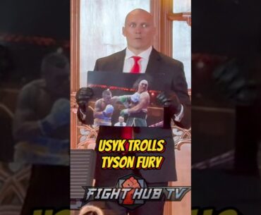 Oleksandr Usyk TROLLS Tyson Fury; has him autograph photo of him getting punched!