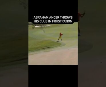 Abraham Ancer throws his club in frustration