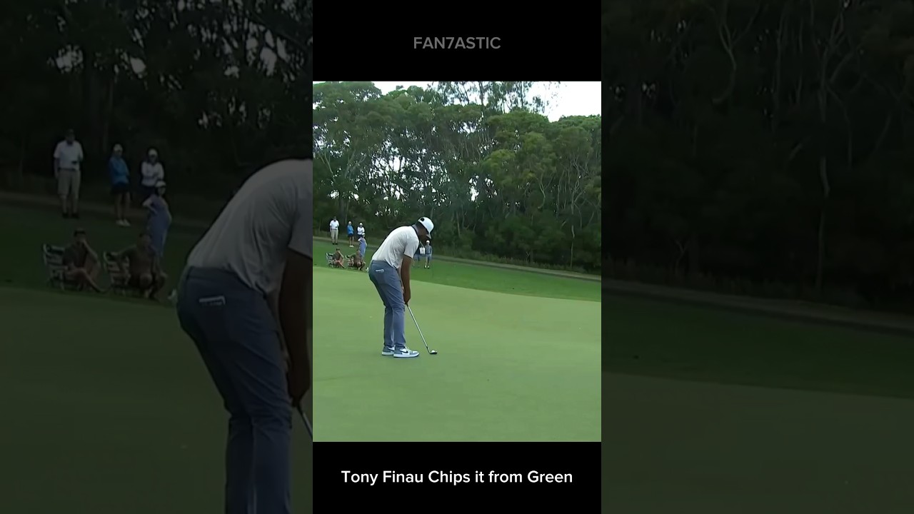 Tony Finau chips it from the green Tony Finau chips it from the green