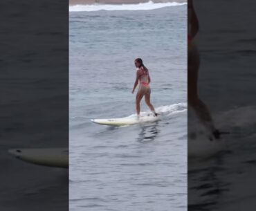 Golf girl takes on surfing