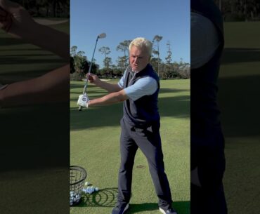 The key to keeping your left arm straight in the golf swing