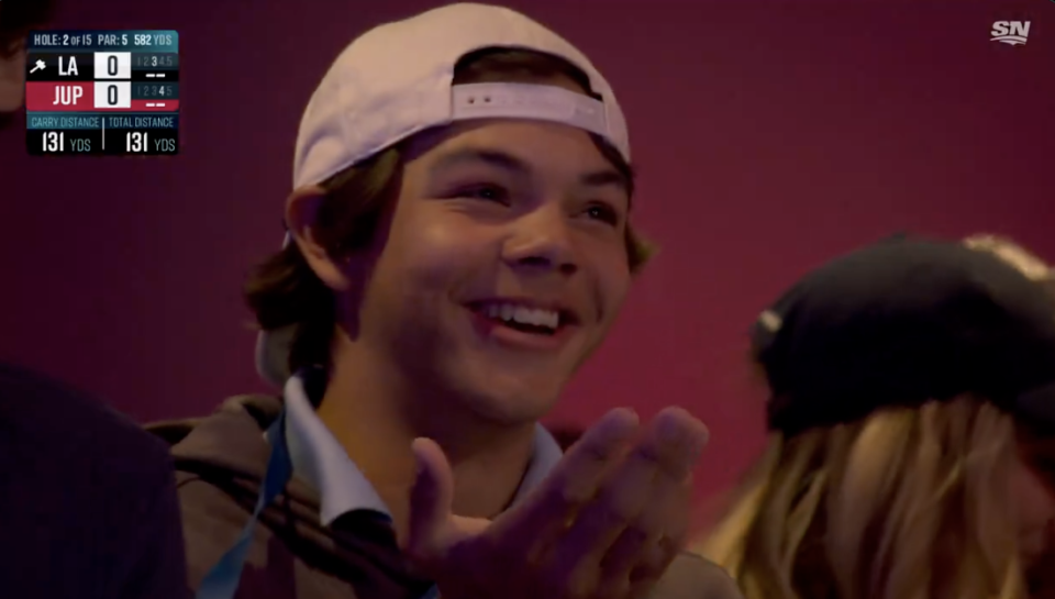 Charlie Woods can't believe what his father Tiger just did. (Via TGL screenshot)