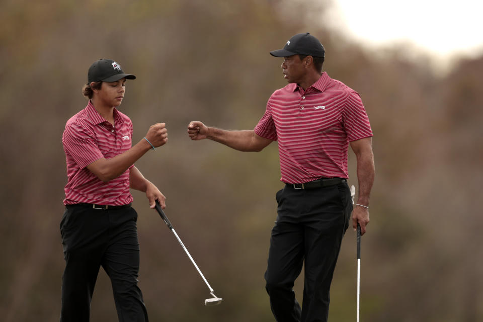 Tiger and Charlie Woods in December. (Douglas P. DeFelice/Getty Images)