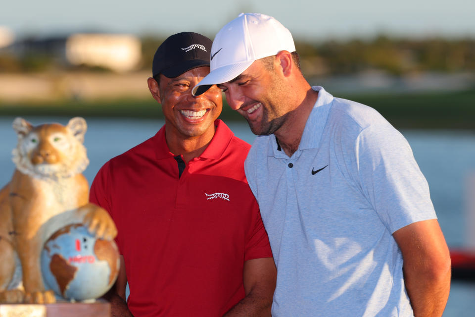 NASSAU, BAHAMAS - DECEMBER 08: Tiger Woods of the United States congratulates Scottie Scheffler of the United States after the final round of the Hero World Challenge 2024 at Albany Golf Course on December 08, 2024 in Nassau, Bahamas. (Photo by Kevin C. Cox/Getty Images)