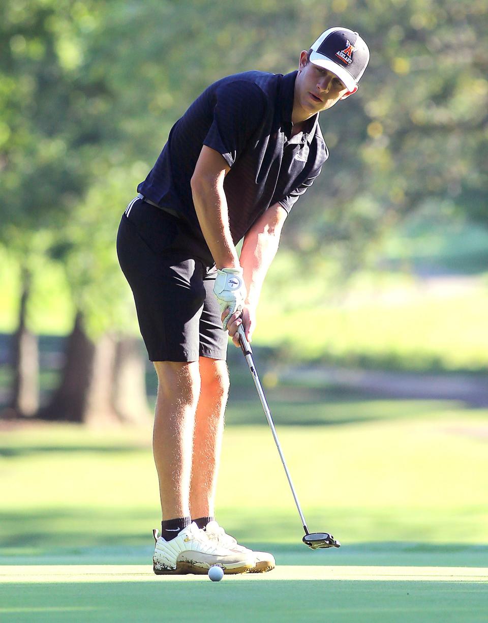 In this file photo from 2022, Keslar Bates putts during the second round of the Times-Gazette Junior Golf championship at Ashland Golf Club in Ashland.