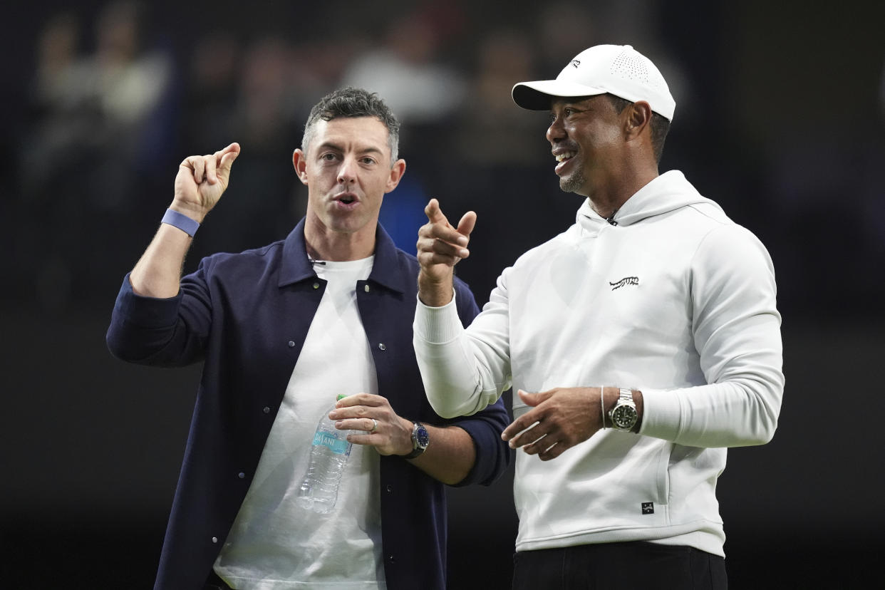 Rory McIlroy and Tiger Woods at the debut of TGL. (AP Photo/Rebecca Blackwell)