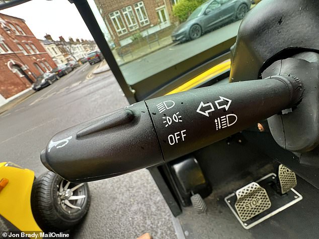A stalk on the wheel controls the indicators, headlights and horn - while the pedals are helpfully labelled 'STOP' and 'GO' so there's no risk of a mix-up