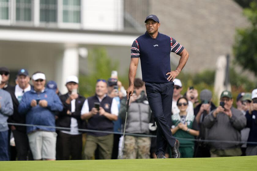 Tiger Woods stands on the first green during the second round of the Genesis Invitational at Riviera Country Club.