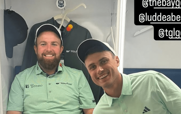 Two male golfers in a locker room.