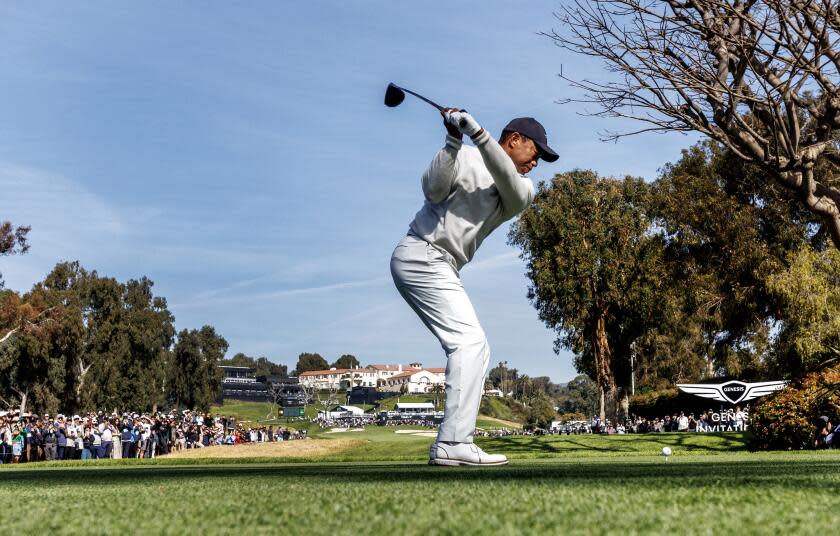 PACIFIC PALISADES, CA - FEBRUARY 15, 2024: Tiger Woods hits his tee shot on the ninth hole during the first round of the Genesis Open at Riviera Country Club on February 15, 2024 in Los Angeles, California.(Gina Ferazzi / Los Angeles Times)