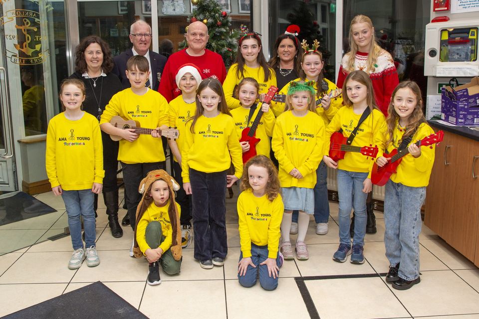 The AMA Young Performers with Arklow Golf Club President Mark Canavan, Club Captain's Robbie Reddin and KathyAnne Ryder at the Arklow Golf Club Christmas party. Photo: Michael Kelly