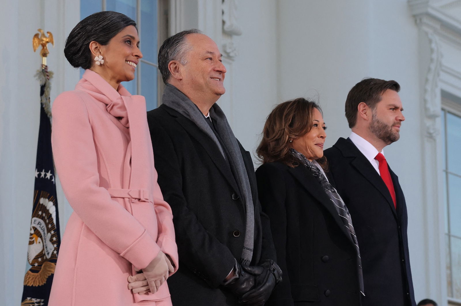 Kamala Harris and her partner, standing between Usha and JD Vance