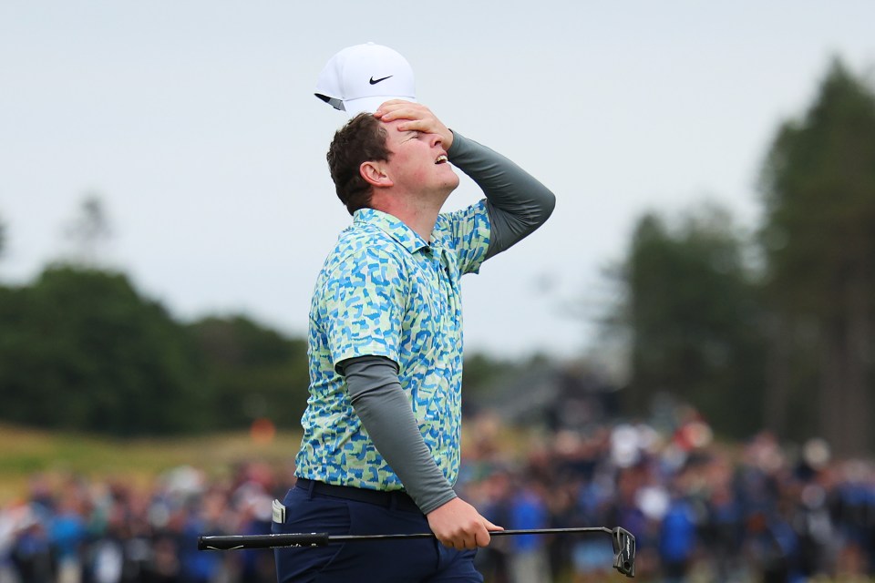 Robert MacIntyre of Scotland reacts after a golf shot.