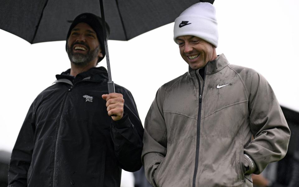 Rory McIlroy of Northern Ireland and Donald Trump Jr. walk the ninth hole prior to The Genesis Invitational 2025 at Torrey Pines Golf Course on February 12, 2025