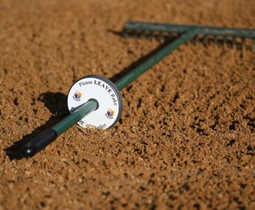 Golf course bunker rakes are there for a reason. Let Fluff show you how to use them