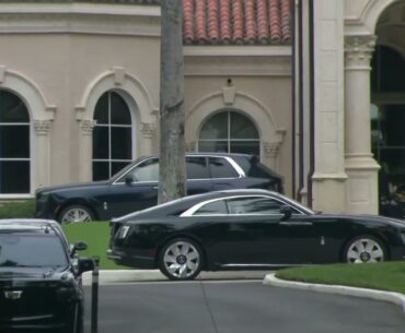 Raw video: President Trump's motorcade arrives at Trump International Golf Club