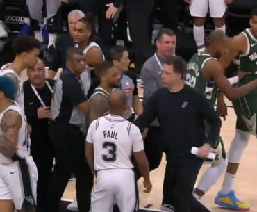Giannis gets so heated at Chris Paul for tripping him and they have to be separated 😳