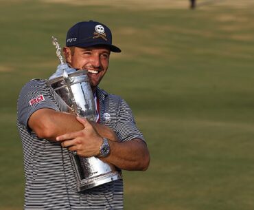 Bryson DeChambeau holds the US Open trophy after winning the 2024 edition at Pinehurst