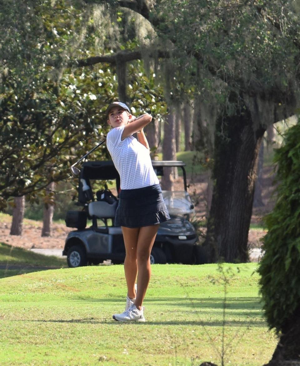 Kai Trump, Benjamin golfer and granddaughter of President-elect Donald Trump, drives the ball on Hole 11 of the Class 1A state championship on Nov. 12, 2024.
