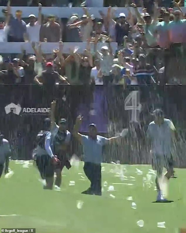 Reed, 34, nailed an ace at the 'Watering Hole', sparking mayhem on the day's opening play (pictured)