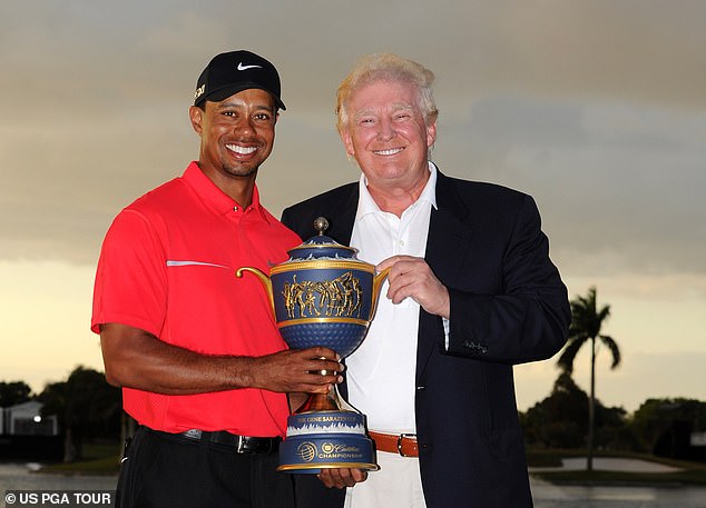 Trump pictured with Woods in 2013 after he won the Cadillac Championship in Florida