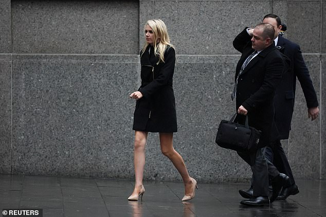 Natalie Harp walks outside Manhattan Federal Court in January 2024 amid the Stormy Daniels hush money case