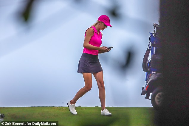 Natalie Harp is photographed on President Donald Trump's West Palm Beach golf course in March 2023. In the book, she got huffy with now White House Chief of Staff Susie Wiles telling the campaign co-chair 'I had to leave the golf course to take this call'