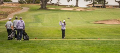 Woman playing golf