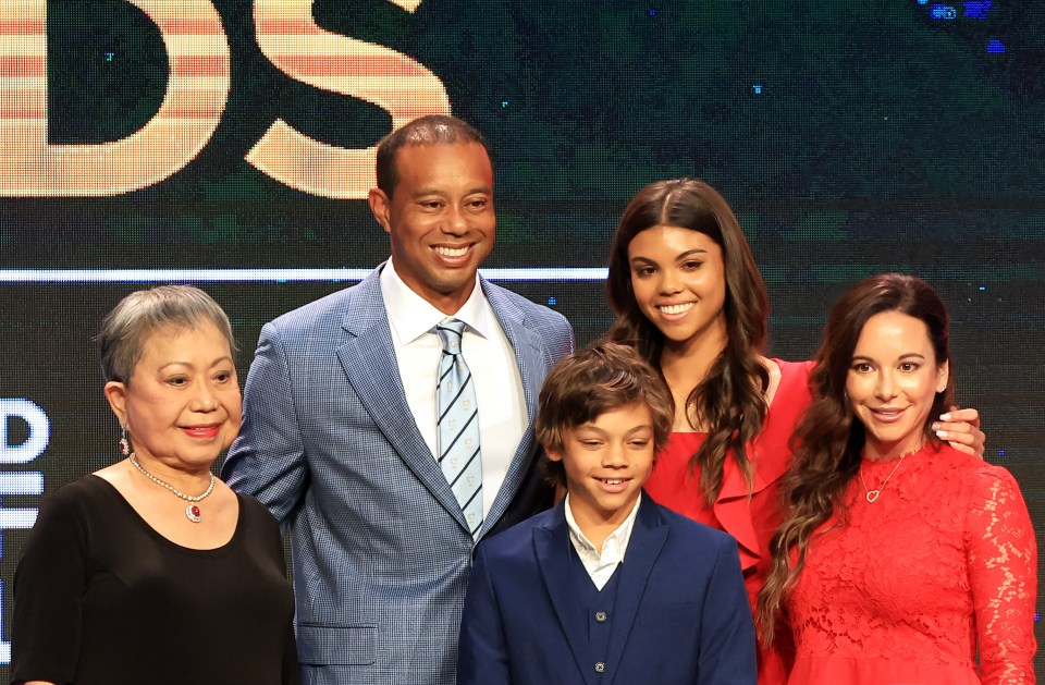PONTE VEDRA BEACH, FLORIDA - MARCH 09: Tiger Woods, mother Kultida Woods (L), children Sam Alexis Woods and Charlie Axel Woods (C) and Erica Herman (R) pose for a photo prior to his induction at the 2022 World Golf Hall of Fame Induction at the PGA TOUR Global Home on March 09, 2022 in Ponte Vedra Beach, Florida. (Photo by Sam Greenwood/Getty Images)