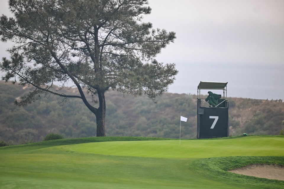 SAN DIEGO, CALIFORNIA - FEBRUARY 13:  A white pin-flag flies on the seventh hole in honor of Kultida Woods, the late mother of Tiger Woods, during the first round of The Genesis Invitational on the South Course at Torrey Pines Golf Course on February 13, 2025 in San Diego, California. The white flag, meant to honor Kultida's heritage, will be used on the seventh hole during all four rounds of competition at The Genesis Invitational. (Photo by Ben Jared/PGA TOUR via Getty Images)