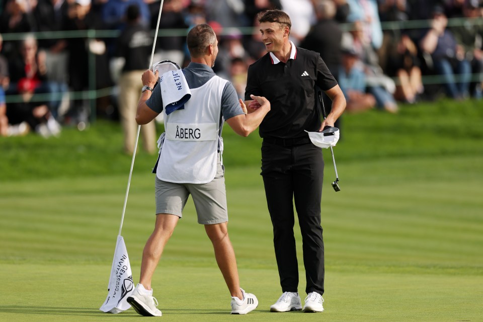 LA JOLLA, CALIFORNIA - FEBRUARY 16: Ludvig Åberg of Sweden and caddie Joe Skovron celebrate on the 18th green during the final round of The Genesis Invitational 2025 at Torrey Pines Golf Course on February 16, 2025 in La Jolla, California. (Photo by Harry How/Getty Images)