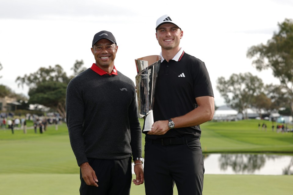 LA JOLLA, CALIFORNIA - FEBRUARY 16: Tiger Woods (L) and Ludvig Åberg of Sweden pose for photos with the trophy after Åberg won The Genesis Invitational 2025 at Torrey Pines Golf Course on February 16, 2025 in La Jolla, California. (Photo by Harry How/Getty Images)