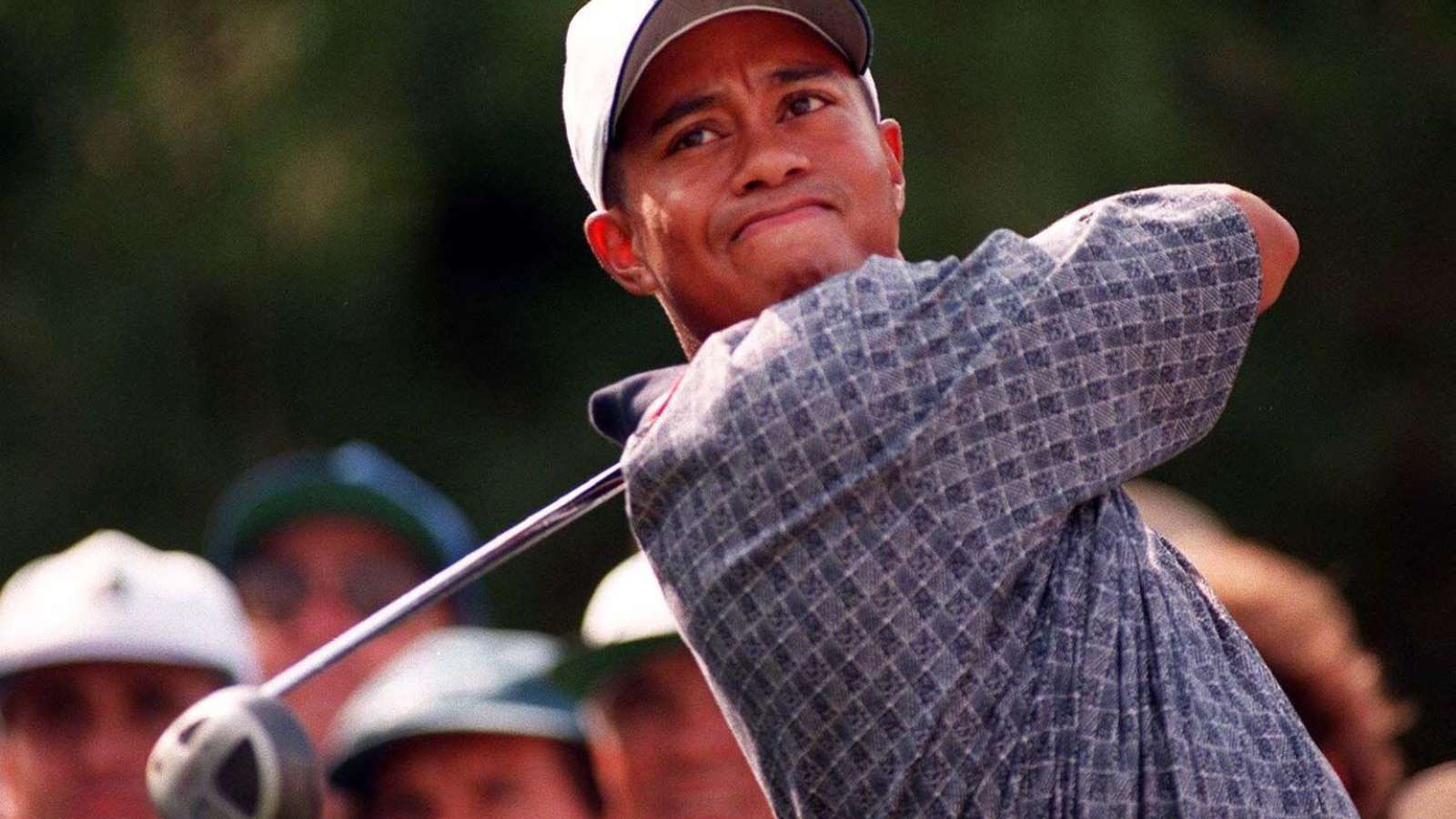 Tiger Woods drives at the 1997 Masters