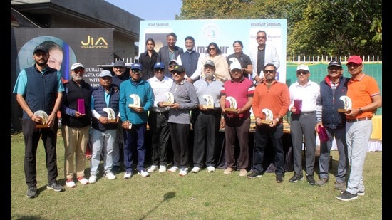 Winners of different handicap categories and other sub-competitions with their trophies at the 8th Amateur Golfers Society Golf Tournament at Panchkula Golf Club on Sunday. (Sant Arora/HT)