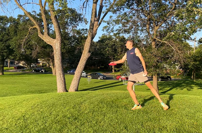 Jonathan throws a frisbee