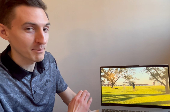 Jonathan watching his attempt back on a laptop