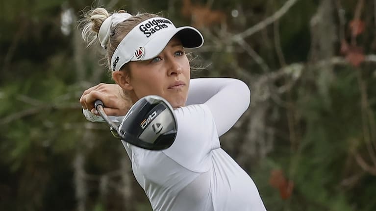 Nelly Korda finishes her drive on the ninth tee during the final round of the Hilton Grand Vacations Tournament of Champions LPGA golf tournament in Orlando.