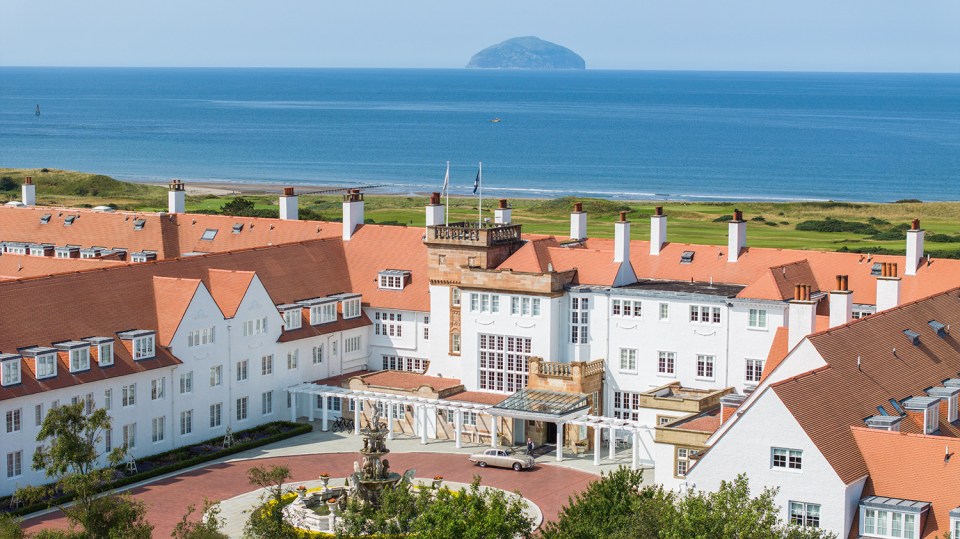 Aerial view of Trump Turnberry resort overlooking the ocean.