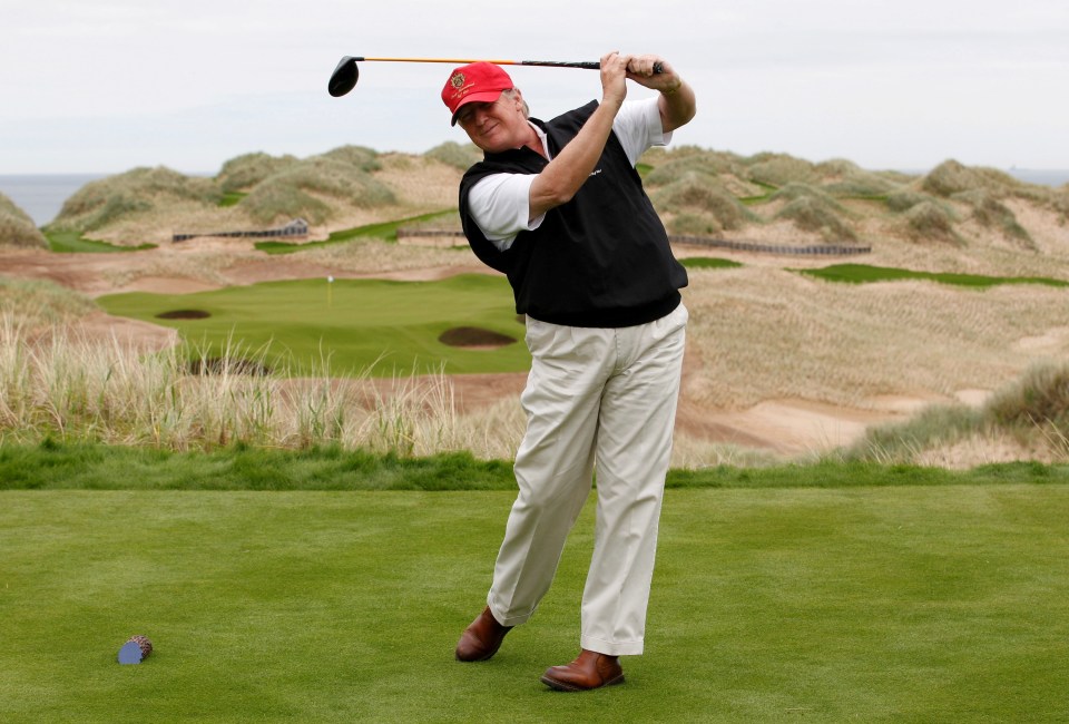 Donald Trump golfing.