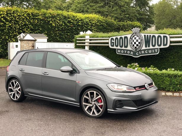 How the grey Golf GTI looked (pictured at Goodwood Motor Circuit) before car cannibals removed a number of parts from the front end in Eastern Road, Sutton Coldfield  