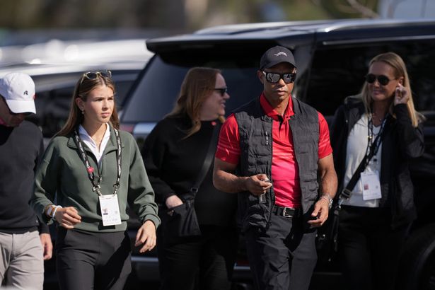  Kai Trump (L) and Tiger Woods