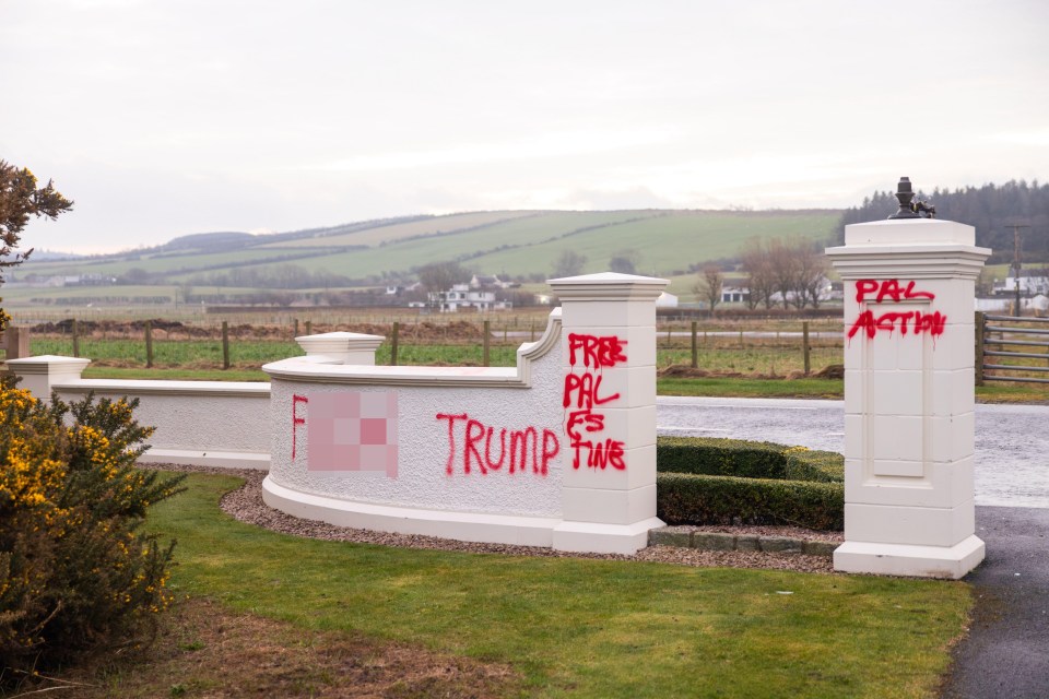 Graffiti reading "F*** Trump" and "Free Palestine" on a wall at Trump Turnberry Golf Club.