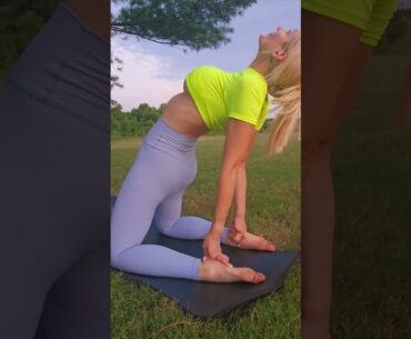 yoga backbend at sunset